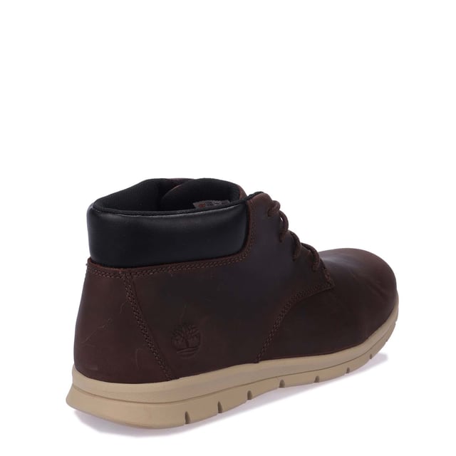 Mens Timberland Graydon Mid Lace Boots in dark brown.- Leather upper.- Lace-up style.- Cushioned collar and tongue.- Embossed logo on heel.- HoverLite comfort outsole and ReBOTL fabric lining.- Durable rubber outsole.- Ref: A5SEZV131
