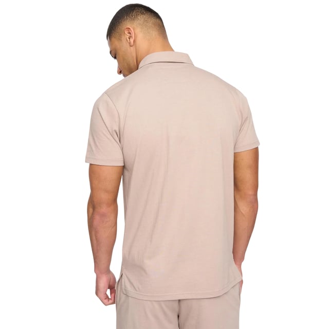 100% Cotton. Fabric: Jersey, Soft Touch. Design: Logo, Rubber Badge. Waistline: Elasticated. Sleeve-Type: Short-Sleeved. Neckline: Turn Down Collar. Fastening: Pull Over, Quarter Zip. Contents: 1 Polo Shirt, 1 Shorts. Fit: Relaxed Fit. S: 38 in. M: 40 in. L: 42 in. XL: 44 in. XXL, XXL, XXL: 46 in, 46 in.