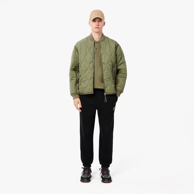 Loose Fit L.12.12 Piqué Badge Polo Shirt Organic cotton piqué Loose fit  dropped shoulders Classic polo collar Genuine mother-of-pearl buttons Large crocodile badge on breast