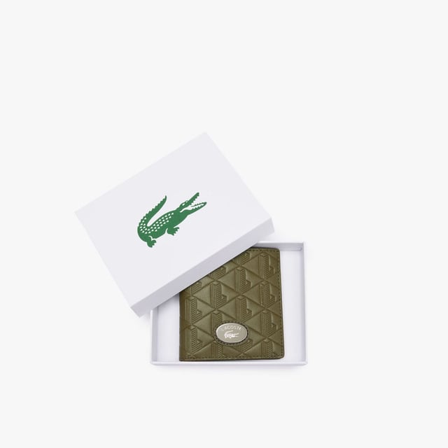 Nomogramme Compact Leather Billfold Dimensions: L3.9 x H3.94 x D0.4 - L10 x H10.5 x D1.8 cm Outer in monogrammed  textured leather 6 card slots Plate with crocodile on front