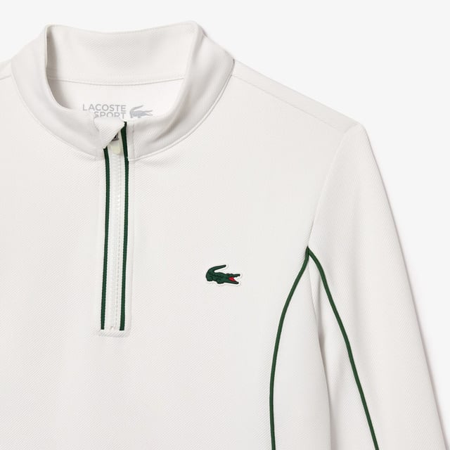 Womens Lacoste SPORT Slim Fit Contrast Sleeve Sport SweatshirtThis layering sweatshirt from Lacoste  sporting experts since 1933  is perfect for tennis or golf. Made from stretch jersey for maximum freedom of movement  with Ultra Dry technology and an anti-UV finish to keep you comfortable and protected. An elegant take on an essential design.- Recycled polyester made from manufacturing offcuts - Slim  fitted cut- Quick drying- Tested by professional players- Silicone crocodile on bust- Slim Fit- Polyester (96%)  Elastane (4%)  Machine washable.- Ref: SF1962-737