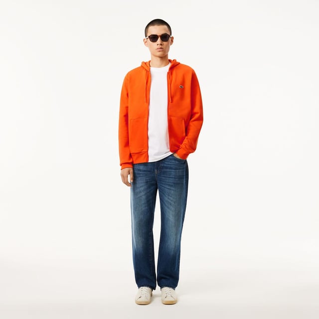 Zip-Up Fleece Hoodie Organic brushed cotton and recycled polyester Classic fit for natural ease Kangaroo pocket Jersey-lined hood Embroidered crocodile on chest