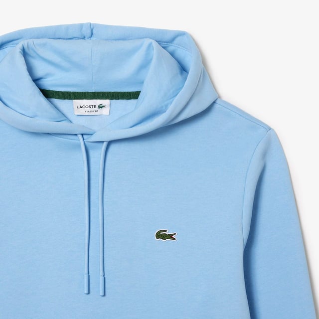 Fleece Hoodie Organic brushed cotton and recycled polyester Classic fit for natural ease Kangaroo pocket Jersey-lined hood Embroidered crocodile on chest