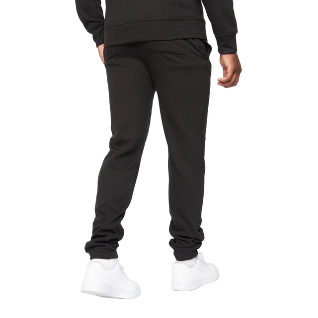 65% Baumwolle, 35% Polyester. Gewebe: angerautes Material. Design: Tintendruck, Logo, Aufschrift. Zum Überziehen. Hi-Build. Taschenart: Zwei Seitentaschen. Taille: Elastisch. Bündchen: Elastisch.