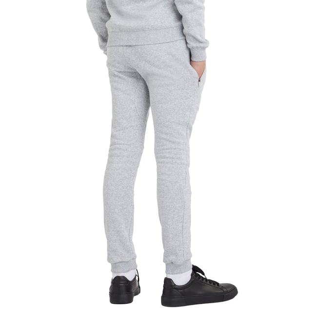 70% Cotton, 30% Polyester. Design: Stacked Logo. Branded Zip Pull, Underarm Panel. Pockets: 2 Side Pockets, Zip. Waistline: Elasticated, Ribbed. Cuff: Fitted, Ribbed.