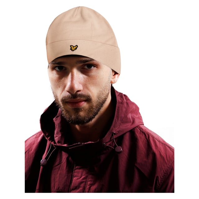 100% Acryl. Marke: Scotts. Gewebe: Jerseyware, gerippt. Design: bestickt, Logo. Verpackung: Hängeetikett. Bündchen: Umgekrempelter Umschlag.