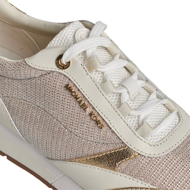 The Allie Stride leather sneakers are perfect for adding an irresistible touch of luxury to any look. This low-top style features shiny chainmail mesh panels and the brand's initials to add a little sparkle to every step. They're perfect for transitioning from the gym to the city.\n\n Details:\n - Almond tip.\n - Lace-up closure.\n - Shiny leather/chain mesh.\n - Padded textile insole.\n - Metallic Michael Kors logo on the back and instep.\n\n A good pair of women's designer sneakers will take you anywhere. Whether you're going for a stroll, exploring the city, or taking a long trip, casual women's sneakers allow you to arrive at your destination in style. If you're looking for a revamped take on a classic, high-top designer sneakers are the best option. Sneakers with a retro-inspired silhouette look great with both cropped jeans and minidresses. For traveling, slip-on sneakers are the best option. They're ideal for slipping on and off during security, as well as for great comfort while exploring a new city.\n Composition: 100% Leather, Textile\n Care:\nUse a soft, damp cloth to clean the surface.