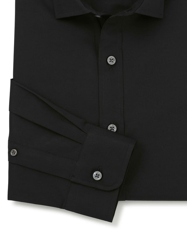 We've added a hint of stretch to this men's slim fit cotton shirt to allow better ease of movement and all-day comfort - whether you're at a wedding or an important business event. You'll find our usual curl-resistant collar, plus single cuffs and back darts.