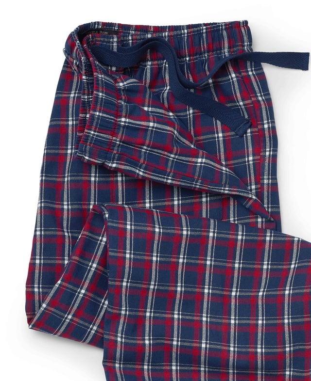 Experience the ultimate in comfort with our red, navy and white check lounge pants. Made from 100% cotton that’s been brushed for cosiness, they are luxuriously soft, wrapping you in luxury warmth perfect for lazy days at home or working from home. 100% pure brushed cotton, warm, soft and cosy. Fully elasticated waist with contrast herringbone. One pocket at the back with embroidered logo. Inside leg on a size Medium is 31" / 79cm. Presented in fully recyclable packaging.