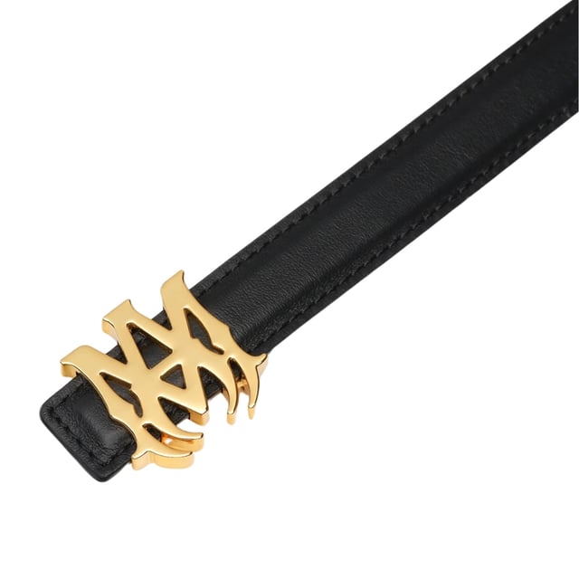 Indulge in the opulence of real leather with the Amiri MA Gold Belt. Enhance any ensemble with this deluxe and fashionable addition. 100% Leather