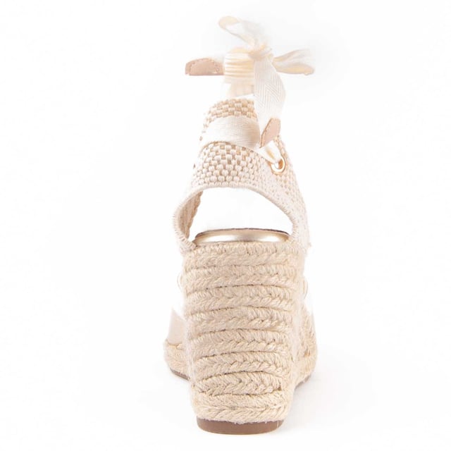 Wedge espadrille for women. 100% natural leather insole. Comfortable fit. Manufactured by other brands for our brand. Approximate measurements: 7 cm wedge and 2 cm platform.