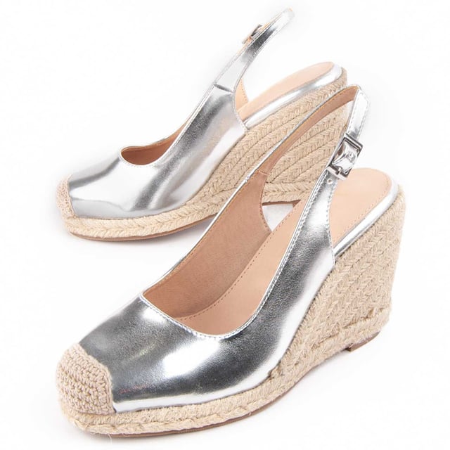 Espadrille met sleehak voor dames. Binnenzool van 100% natuurlijk leer. Comfortabele pasvorm. Gefabriceerd door andere merken voor ons merk. Geschatte afmetingen: 8 cm wig en 2 cm platform.