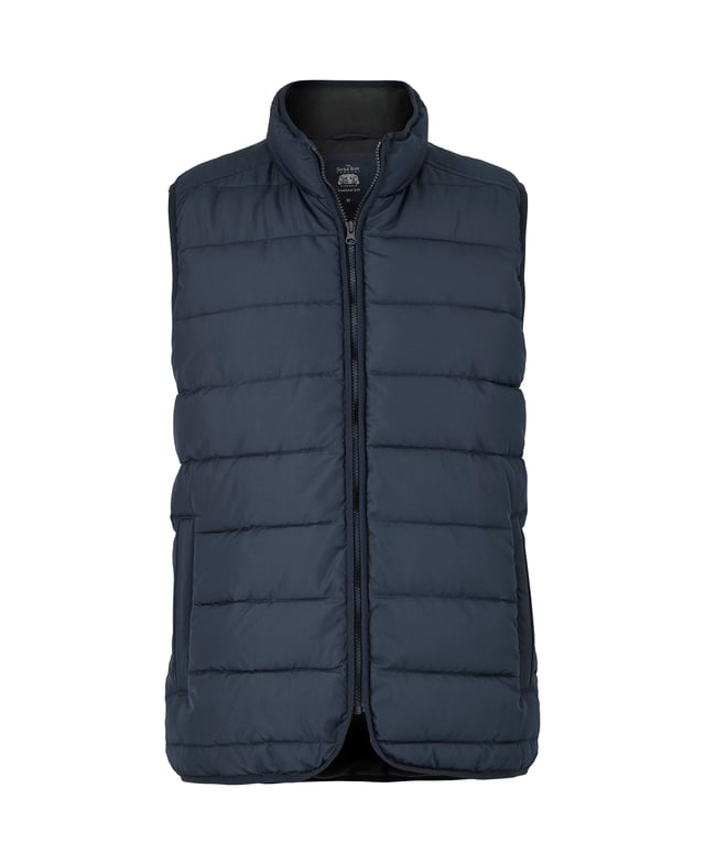 A sustainable choice, this quilted gilet is made using recycled fabrics, including the padding. There's multiple pockets to keep your essentials safe, while the back is cut a little longer than the front to avoid gaping. Tunnel quilted showerproof 100% ocean recycled polyester outer.  Eco friendly down-like 230g wadding for good insulation without the weight.  Lined in 100% grey polyester microfleece.  Outside 2 zipped welt pockets, inside one chest pocket.  Back is a little longer than front.  Funnel neck with front zip.  Centre back length on a size Medium is 72.5cm.  Can be dry cleaned.  Presented in fully recyclable packaging.