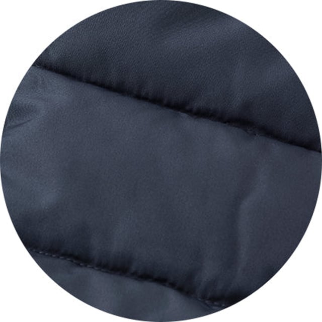 A sustainable choice, this quilted gilet is made using recycled fabrics, including the padding. There's multiple pockets to keep your essentials safe, while the back is cut a little longer than the front to avoid gaping. Tunnel quilted showerproof 100% ocean recycled polyester outer.  Eco friendly down-like 230g wadding for good insulation without the weight.  Lined in 100% grey polyester microfleece.  Outside 2 zipped welt pockets, inside one chest pocket.  Back is a little longer than front.  Funnel neck with front zip.  Centre back length on a size Medium is 72.5cm.  Can be dry cleaned.  Presented in fully recyclable packaging.