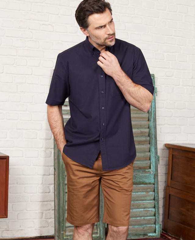 An essential staple for the warmer months, our stretch cotton chinos are comfortable and breathable - helping you keep cool on long commutes and summer holidays. Cut to a tailored fit shape, they pair perfectly with a short-sleeved shirt and penny loafers. 96% cotton, 4% elastane. Medium weight durable cotton twill with a slight amount of stretch for comfort and retaining shape. Flat front, slim through the thigh. Length finishes just above the knee. Slanted pockets; jetted buttoned back pockets. Machine washable at 40°C. Safety warning: keep away from fire.