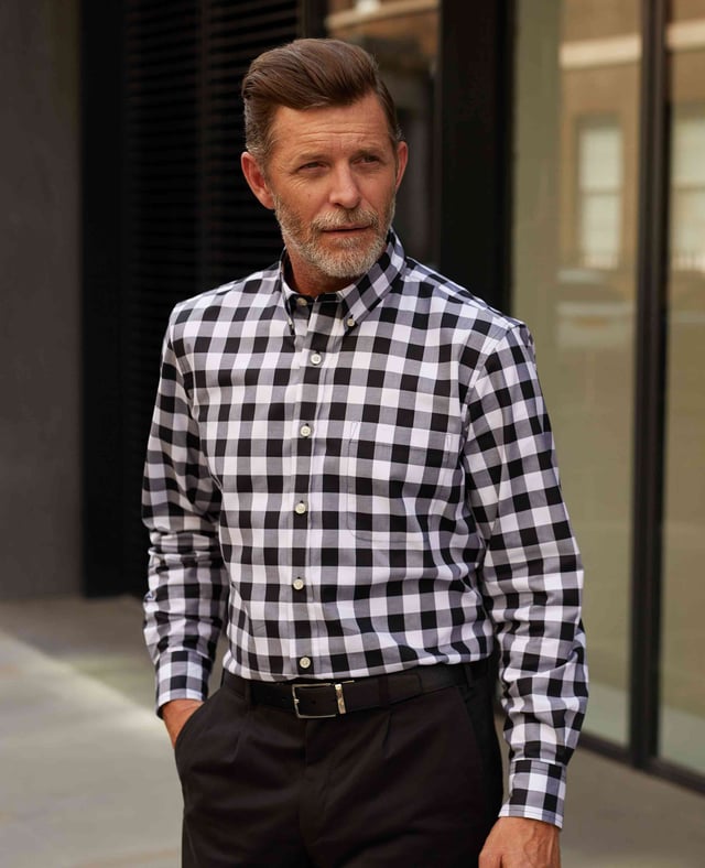 Featuring a bold black and white check, this button-down shirt will stand proud with a pair of chinos or jeans. It's made from 100% BCI cotton in a  fine twill weave and is cut to a classic fit shape for comfort.