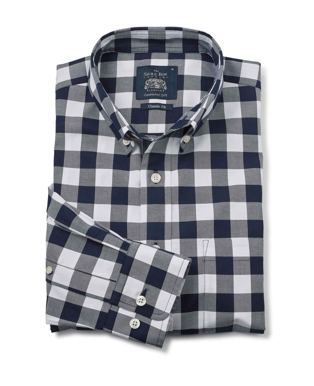 This men's casual shirt features a bold navy and white check design. It's made from 100% BCI cotton in a luxurious fine twill weave and features a classic button-down collar. The classic fit shape offers plenty of room for movement.