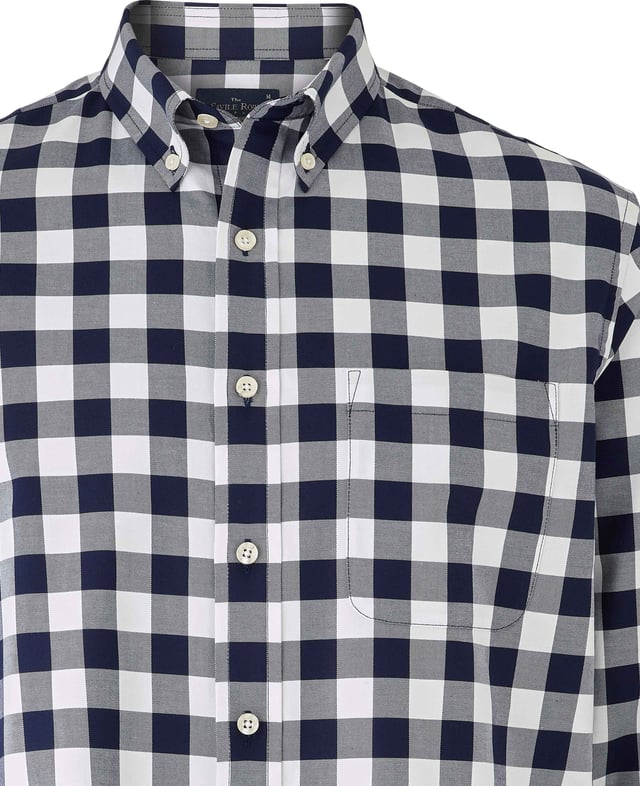This men's casual shirt features a bold navy and white check design. It's made from 100% BCI cotton in a luxurious fine twill weave and features a classic button-down collar. The classic fit shape offers plenty of room for movement.