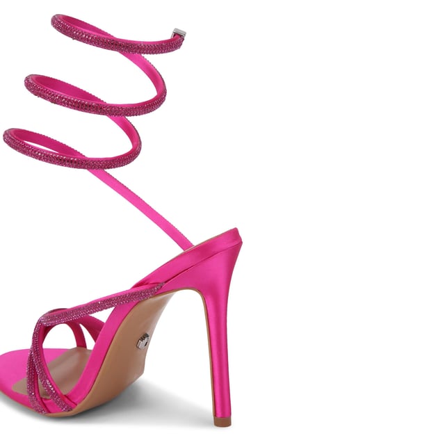 This Carvela Spiral heel features a flattering fuchsia crystal embellished strap which wraps around the ankle. The crystal straps continue across the foot and toe to elongate. Heel height: 105mm. This product features All Day Long Technology.