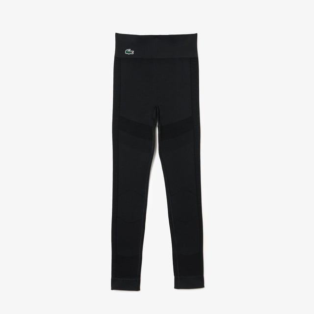 Dames Lacoste SPORT Seamless Absorberende Sport Leggings in zwart. Niets zal je kunnen stoppen in deze tweede-huid stijl legging. Naadloos: geen vlekken, geen schuurplekken, maximaal comfort! Ondersteunend maar niet beperkend gemaakt om je droog te houden.- Stretch jacquard- Getest en goedgekeurd door sporters- Tweekleurige siliconen krokodil- Polyamide (93%) Elastaan (7%).  Machinewasbaar.- Ref: OF1022-031In onze ervaring valt dit model klein uit. U kunt een maat groter kiezen dan u normaal zou bestellen. Dit advies is alleen bedoeld als richtlijn.