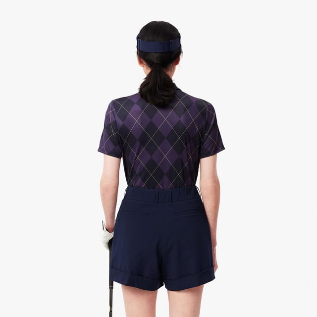 Womens Lacoste SPORT Regular Fit UV Protect Golf Polo Shirt in navy blue - purpleThis Lacoste polo shirt is designed for expert golfers  featuring Ultra Dry technology and UPF50+ protection. With a print inspired by the Lacoste archives for added croco-style. We'll handle the look; you handle the swing.- Recycled polyester made from manufacturing offcuts- Regular fit  straight cut- Polo collar- Tested by golf professionals- UPF 50 UV protection- Silicone crocodile on chest- Main fabric: Polyester (94%)  Elastane (6%) - Collar: Polyester (98%)  Elastane (2%).  Machine washable.- Ref: PF7453-IEK