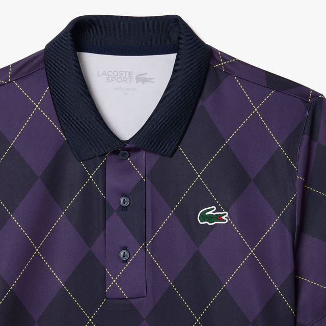 Womens Lacoste SPORT Regular Fit UV Protect Golf Polo Shirt in navy blue - purpleThis Lacoste polo shirt is designed for expert golfers  featuring Ultra Dry technology and UPF50+ protection. With a print inspired by the Lacoste archives for added croco-style. We'll handle the look; you handle the swing.- Recycled polyester made from manufacturing offcuts- Regular fit  straight cut- Polo collar- Tested by golf professionals- UPF 50 UV protection- Silicone crocodile on chest- Main fabric: Polyester (94%)  Elastane (6%) - Collar: Polyester (98%)  Elastane (2%).  Machine washable.- Ref: PF7453-IEK