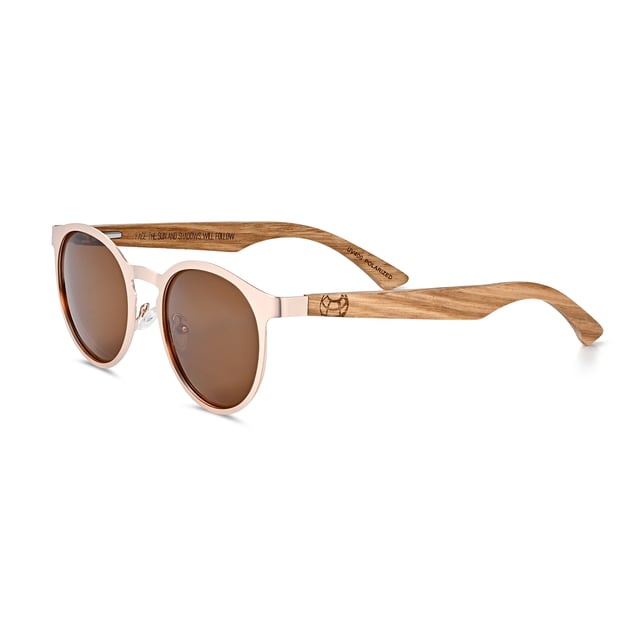 Earth Wood Reine Polarized Sunglasses - Walnut/Brown Frame: Rose Gold Metal ; Arm: Walnut Wood; Earpiece: Walnut Wood; Lens: Brown Multi-Layer Triacetate Cellulose (TAC); Mirrored Lens: No; Gradient Lens: No; Polarization: Optical Quality; UV Protection: 100% UVA/UVB; Hinge: Spring Loaded Stainless Steel; Adjustable Nosepads: Yes; Lens Width: 60mm; Temple Length: 148mm; Bridge Width: 20mm.