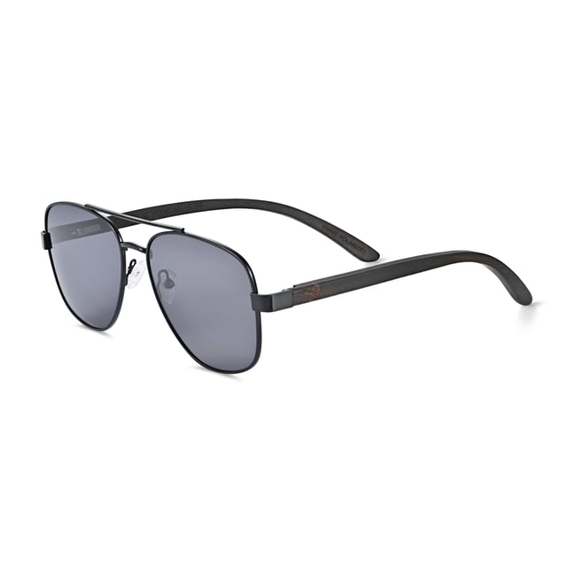 Earth Wood Kotor Polarized Sunglasses - Black/Black Frame: Black Metal ; Arm: Black Wood; Earpiece: Black Wood; Lens: Black Multi-Layer Triacetate Cellulose (TAC); Mirrored Lens: No; Gradient Lens: No; Polarization: Optical Quality; UV Protection: 100% UVA/UVB; Hinge: Spring Loaded Stainless Steel; Adjustable Nosepads: Yes; Lens Width: 55mm; Temple Length: 152mm; Bridge Width: 20mm.