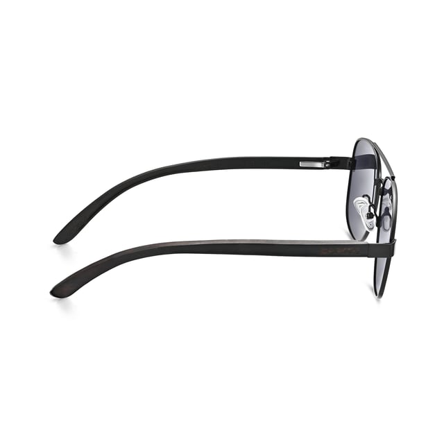 Earth Wood Kotor Polarized Sunglasses - Black/Black Frame: Black Metal ; Arm: Black Wood; Earpiece: Black Wood; Lens: Black Multi-Layer Triacetate Cellulose (TAC); Mirrored Lens: No; Gradient Lens: No; Polarization: Optical Quality; UV Protection: 100% UVA/UVB; Hinge: Spring Loaded Stainless Steel; Adjustable Nosepads: Yes; Lens Width: 55mm; Temple Length: 152mm; Bridge Width: 20mm.