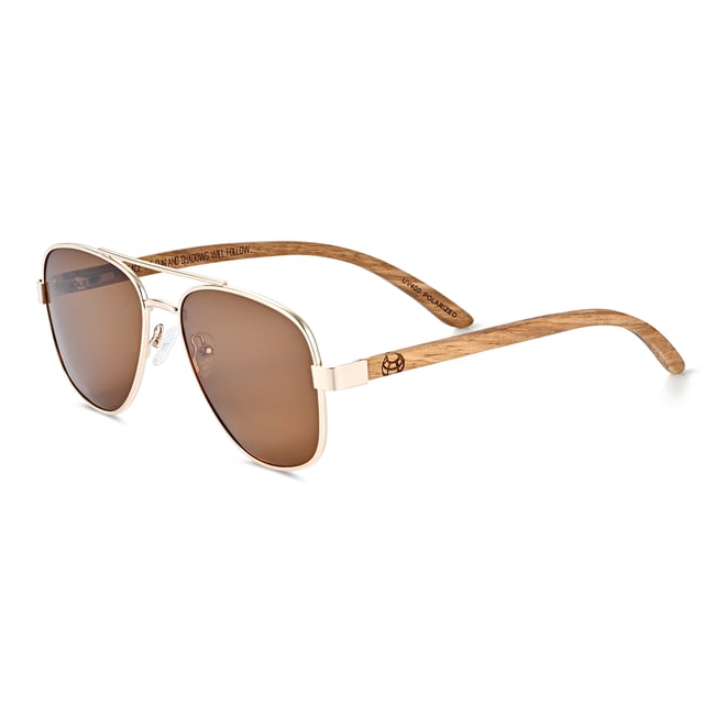 Earth Wood Kotor Polarized Sunglasses - Zebra/Brown Frame: Rose Gold Metal ; Arm: Zebra Wood; Earpiece: Zebra Wood; Lens: Brown Multi-Layer Triacetate Cellulose (TAC); Mirrored Lens: No; Gradient Lens: No; Polarization: Optical Quality; UV Protection: 100% UVA/UVB; Hinge: Spring Loaded Stainless Steel; Adjustable Nosepads: Yes; Lens Width: 55mm; Temple Length: 152mm; Bridge Width: 20mm.
