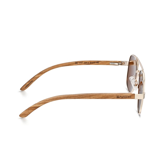 Earth Wood Kotor Polarized Sunglasses - Zebra/Brown Frame: Rose Gold Metal ; Arm: Zebra Wood; Earpiece: Zebra Wood; Lens: Brown Multi-Layer Triacetate Cellulose (TAC); Mirrored Lens: No; Gradient Lens: No; Polarization: Optical Quality; UV Protection: 100% UVA/UVB; Hinge: Spring Loaded Stainless Steel; Adjustable Nosepads: Yes; Lens Width: 55mm; Temple Length: 152mm; Bridge Width: 20mm.