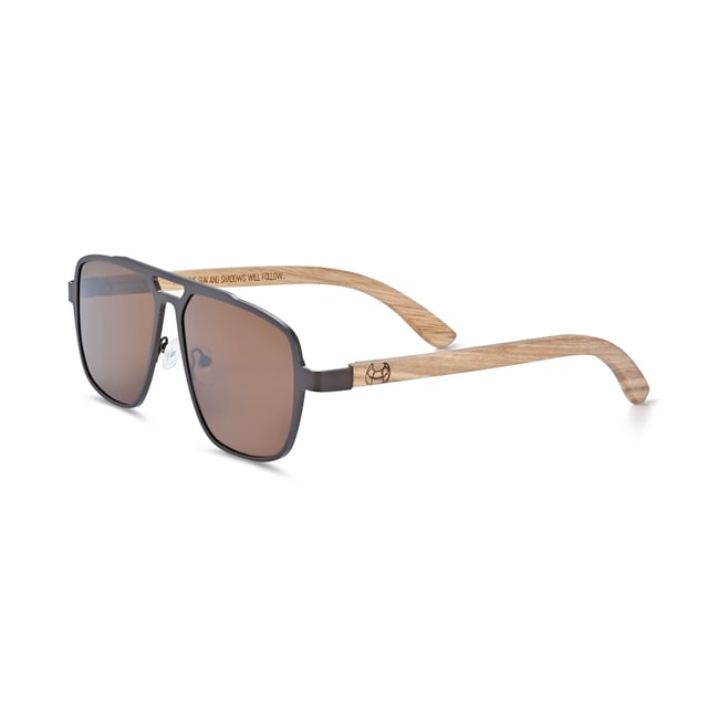 Earth Wood Avila Polarized Sunglasses - Zebra/Brown Frame: Rose Gold Metal ; Arm: Zebra Wood; Earpiece: Zebra Wood; Lens: Brown Multi-Layer Triacetate Cellulose (TAC); Mirrored Lens: No; Gradient Lens: No; Polarization: Optical Quality; UV Protection: 100% UVA/UVB; Hinge: Spring Loaded Stainless Steel; Adjustable Nosepads: Yes; Lens Width: 55mm; Temple Length: 157mm; Bridge Width: 20mm.