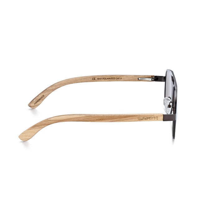 Earth Wood Avila Polarized Sunglasses - Zebra/Brown Frame: Rose Gold Metal ; Arm: Zebra Wood; Earpiece: Zebra Wood; Lens: Brown Multi-Layer Triacetate Cellulose (TAC); Mirrored Lens: No; Gradient Lens: No; Polarization: Optical Quality; UV Protection: 100% UVA/UVB; Hinge: Spring Loaded Stainless Steel; Adjustable Nosepads: Yes; Lens Width: 55mm; Temple Length: 157mm; Bridge Width: 20mm.