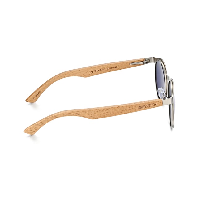 Earth Wood Reine Polarized Sunglasses - Bamboo/Green Frame: Silver Metal ; Arm:Bamboo Wood; Earpiece: Bamboo Wood; Lens: Pink/Green Multi-Layer Triacetate Cellulose (TAC); Mirrored Lens: No; Gradient Lens: No; Polarization: Optical Quality; UV Protection: 100% UVA/UVB; Hinge: Spring Loaded Stainless Steel; Adjustable Nosepads: Yes; Lens Width: 60mm; Temple Length: 148mm; Bridge Width: 20mm.