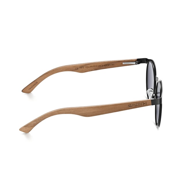 Earth Wood Reine Polarized Sunglasses - Dark Brown/Black Frame: Black Metal ; Arm: Dark Brown Wood; Earpiece: Dark Brown Wood; Lens: Black Multi-Layer Triacetate Cellulose (TAC); Mirrored Lens: No; Gradient Lens: No; Polarization: Optical Quality; UV Protection: 100% UVA/UVB; Hinge: Spring Loaded Stainless Steel; Adjustable Nosepads: Yes; Lens Width: 60mm; Temple Length: 148mm; Bridge Width: 20mm.