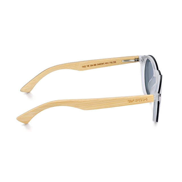 Earth Wood Tulum Polarized Sunglasses - Bamboo/Silver Frame: Silver Polycarbonate ; Arm: Bamboo Wood; Earpiece: Bamboo Wood; Lens:Silver Multi-Layer Triacetate Cellulose (TAC); Mirrored Lens: No; Gradient Lens: No; Polarization: Optical Quality; UV Protection: 100% UVA/UVB; Hinge: Spring Loaded Stainless Steel; Adjustable Nosepads: Yes; Lens Width: 49mm; Temple Length: 145mm; Bridge Width: 21mm.