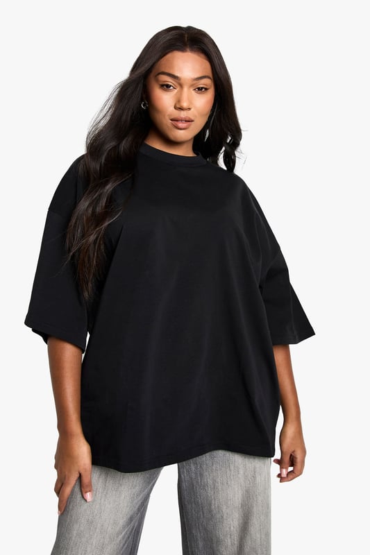 Super oversized fit for maximum comfort and contemporary style
        Crafted from soft cotton fabric for all-day wearability
        Relaxed dropped shoulders and roomy elbow-length sleeves
        Clean, minimalist design with a subtle crew neckline
        Generous length providing versatile styling options
    
    Make a bold statement with this super oversized cotton T-shirt from Boohoo. The relaxed silhouette creates an effortlessly cool vibe that works brilliantly with slim-fit bottoms for a balanced look. As seen on our model, pair with light grey joggers or leggings for casual daytime outings. The generous proportions allow for various styling options-try a half-tuck at the front with high-waisted jeans, or layer over cycling shorts for an on-trend ensemble. Perfect for casual coffee dates, weekend shopping trips, or lounging at home in style. The versatile design transitions seamlessly from day to night-simply add statement jewellery and trainers for an elevated casual look. This T-shirt embodies the laid-back yet fashion-forward aesthetic that's essential for your everyday wardrobe.