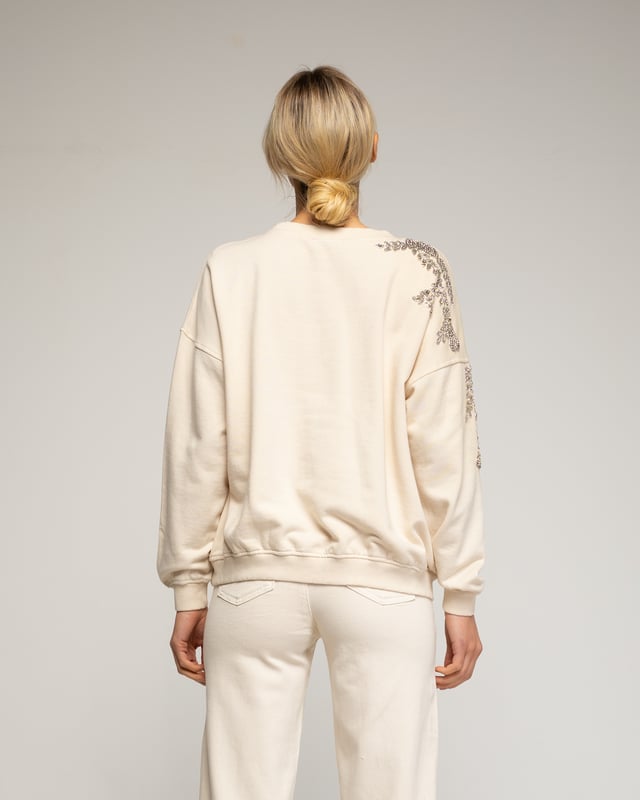 Sweatshirt med paljetter på krage och ärmar