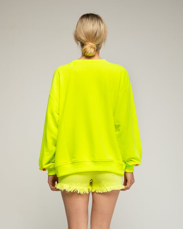 Fluor sweatshirt met "smile" patroon en borduursel op voorkant en manchetten