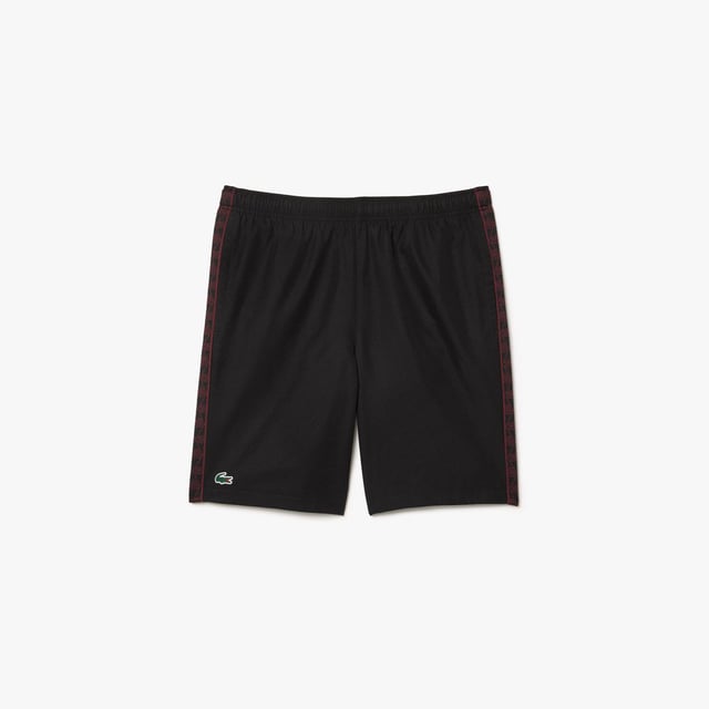 Diamond Taffeta Tennis Shorts Recycled polyester diamond taffeta  limiting the production of virgin materials Regular  straight cut Adjustable drawstring waist Short cut: crotch height 21 cm Silicone crocodile on side