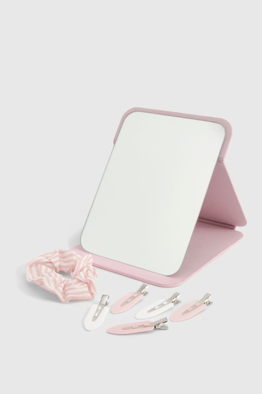 Compact folding mirror for on-the-go touch-ups
        Soft, plush scrunchie for effortless hair styling
        Set of practical hair clips in complementary hues
        Convenient gift set perfect for beauty enthusiasts
        Ideal for festive celebrations and Christmas gifting
    
    Indulge in the ultimate beauty experience with this charming Boohoo gift set, designed to make you feel fabulous this festive season. The compact folding mirror is your perfect companion for quick touch-ups, ensuring you're always ready for those impromptu Christmas selfies. Pair it with the plush scrunchie to create effortless hairstyles that transition seamlessly from day to night. The set of practical hair clips adds a touch of flair to any look, whether you're heading to a festive celebration or preparing for Christmas Day. This versatile collection is not just a treat for yourself, but also makes for a delightful gift for your fashion-forward friends. Embrace the joy of the season and radiate confidence with this must-have beauty set that combines practicality with style, perfect for the Boohoo girl who loves to shine at every holiday gathering.