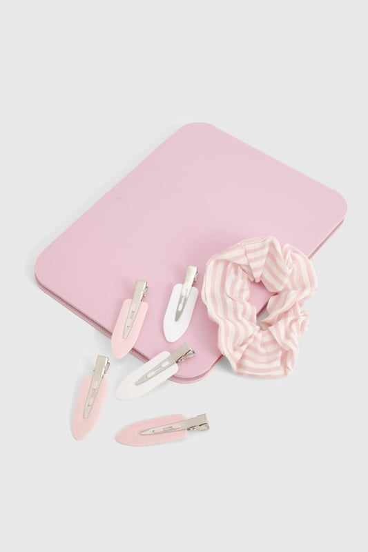 Compact folding mirror for on-the-go touch-ups
        Soft, plush scrunchie for effortless hair styling
        Set of practical hair clips in complementary hues
        Convenient gift set perfect for beauty enthusiasts
        Ideal for festive celebrations and Christmas gifting
    
    Indulge in the ultimate beauty experience with this charming Boohoo gift set, designed to make you feel fabulous this festive season. The compact folding mirror is your perfect companion for quick touch-ups, ensuring you're always ready for those impromptu Christmas selfies. Pair it with the plush scrunchie to create effortless hairstyles that transition seamlessly from day to night. The set of practical hair clips adds a touch of flair to any look, whether you're heading to a festive celebration or preparing for Christmas Day. This versatile collection is not just a treat for yourself, but also makes for a delightful gift for your fashion-forward friends. Embrace the joy of the season and radiate confidence with this must-have beauty set that combines practicality with style, perfect for the Boohoo girl who loves to shine at every holiday gathering.