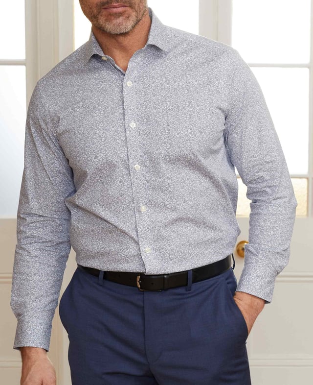 This printed slim fit shirt has been made from beautifully soft cotton with a hint of stretch to allow better movement and ultimate comfort. It's complete with our famous curl-resistant collar but has been given a shorter hem so you can wear it untucked.