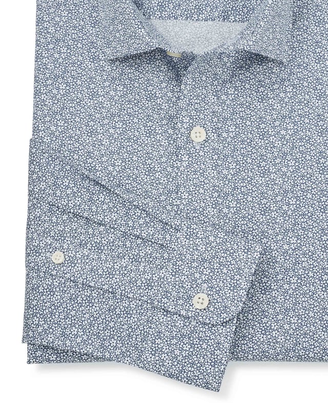 This printed slim fit shirt has been made from beautifully soft cotton with a hint of stretch to allow better movement and ultimate comfort. It's complete with our famous curl-resistant collar but has been given a shorter hem so you can wear it untucked.
