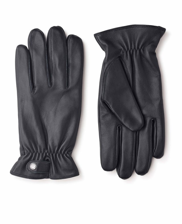 You don't have to worry about cold hands this winter thanks to our men's classic black gloves. Crafted from soft Nappa leather, they're finished with cosy lining for extra warmth. We think they make an excellent gift idea for him. 100% nappa leather soft and supple. Polyester fleece lining cosy and warm. Dual sized. Size s/m measurements: 1/2 palm width - 11cm, 1/2 cuff width - 12cm, middle finger length - 8.8cm. size M/l measurements: 1/2 palm width - 11.5cm, 1/2 cuff width - 12.5cm, middle finger length - 9cm.