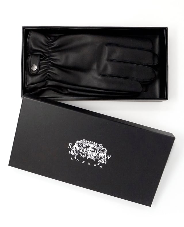 You don't have to worry about cold hands this winter thanks to our men's classic black gloves. Crafted from soft Nappa leather, they're finished with cosy lining for extra warmth. We think they make an excellent gift idea for him. 100% nappa leather soft and supple. Polyester fleece lining cosy and warm. Dual sized. Size s/m measurements: 1/2 palm width - 11cm, 1/2 cuff width - 12cm, middle finger length - 8.8cm. size M/l measurements: 1/2 palm width - 11.5cm, 1/2 cuff width - 12.5cm, middle finger length - 9cm.