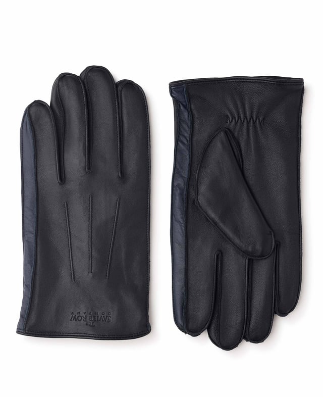An essential winter accessory, our men's leather gloves will keep you warm once the temperature drops. For extra warmth, we've included cosy fleece lining that feels like your favourite blanket. 100% nappa leather soft and supple. Polyester fleece lining cosy and warm. Navy contrast panel in between fingers. Dual sized. Size s/m measurements: 1/2 palm width - 11cm, 1/2 cuff width - 12cm, middle finger length - 8.8cm.