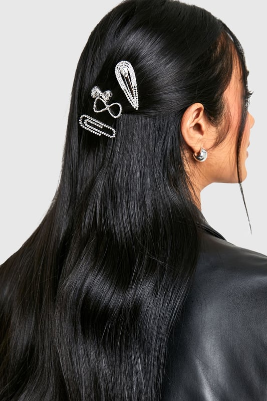 Set of three versatile hair clips
        Adorned with sparkling diamante detailing
        Varied designs for multiple styling options
        Secure snap closure for easy application
        Ideal for adding a touch of glamour to any hairstyle
    
    Elevate your hair game with this stunning trio of diamante-encrusted hair clips. Perfect for those nights out when you want to add a bit of sparkle to your look, these versatile accessories can be worn individually or combined for maximum impact. Whether you're heading to the club, meeting friends for drinks, or embarking on a night of urban adventure, these clips will ensure your hair is on point. Style them with sleek straight locks for a modern edge, or use them to secure an elegant updo for a more sophisticated vibe. The varied designs offer endless styling possibilities, allowing you to customise your look to suit any outfit or occasion. These hair clips are the perfect finishing touch to transform your ensemble from day to night, adding that extra bit of glitz that will have you shining on the dance floor.
