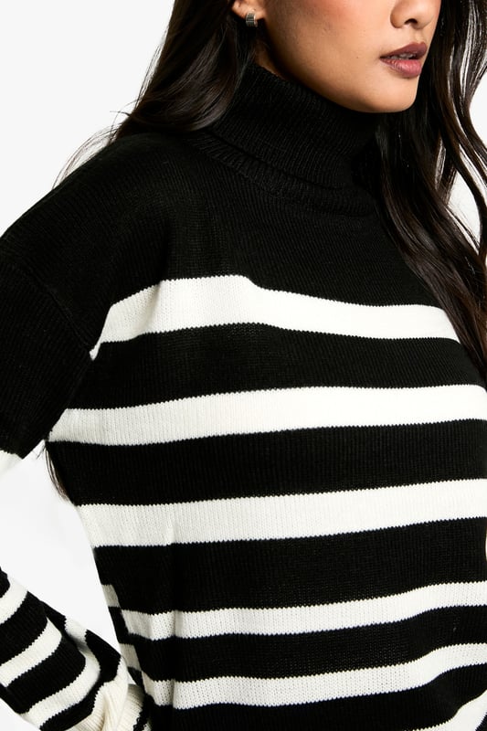 Bold striped pattern for a striking visual impact
        Cosy roll neck design for extra warmth
        Long sleeves with ribbed cuffs for a snug fit
        Relaxed silhouette for comfortable everyday wear
        Versatile design suitable for various casual occasions
    
    Make a statement with this eye-catching Stripe Roll Neck Jumper from Boohoo. The bold contrast between the stripes creates a captivating look that's sure to turn heads. Perfect for the fashion-forward woman who loves to stay on-trend, this jumper offers both style and comfort. The roll neck provides extra warmth on chilly days, while the relaxed fit ensures ease of movement. Style it with wide-leg trousers and chunky boots for a contemporary casual look, or pair it with a midi skirt and trainers for a chic weekend ensemble. Ideal for family gatherings, coffee dates with friends, or casual outings, this jumper is a versatile addition to your wardrobe that can be dressed up or down with ease. Its timeless design ensures it will remain a favourite for seasons to come.