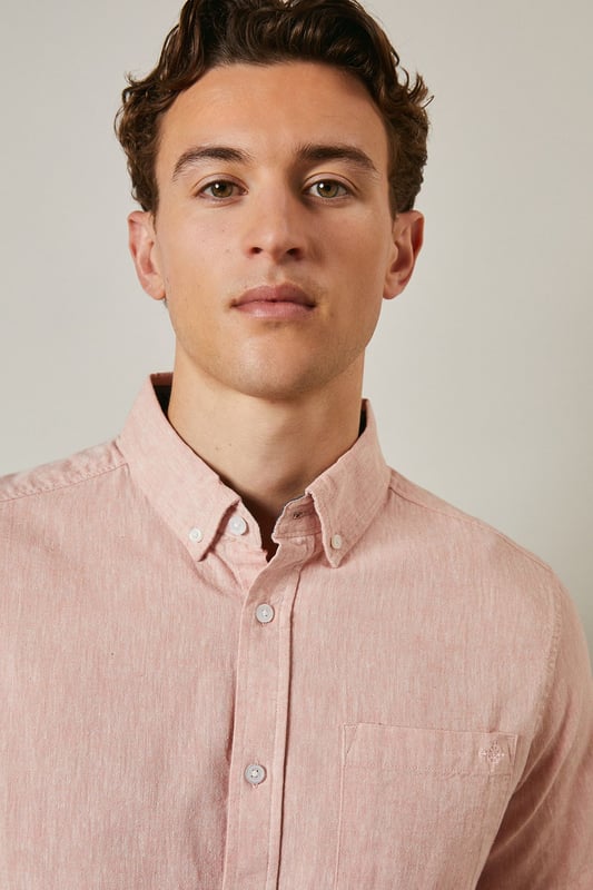 Textured woven fabric with subtle surface interest for added dimension
        Classic button-down collar for a smart-casual finish
        Convenient chest pocket detail for practical styling
        Short sleeves with neat hems perfect for warmer days
        Centre back pleat providing enhanced comfort and movement
    
    This Maine textured short sleeve shirt combines relaxed comfort with understated style. The button-down collar offers a refined touch whilst maintaining a laid-back feel, making it ideal for casual settings. Style as shown with light-coloured chino shorts and white trainers for effortless summer outings, or pair with tailored trousers for garden parties and family gatherings. The textured fabric adds subtle character to your ensemble without overwhelming it. For cooler evenings, layer under a lightweight bomber jacket or cardigan. This versatile shirt transitions seamlessly from daytime casual to evening drinks, making it an essential addition to your warm-weather wardrobe. The relaxed fit ensures all-day comfort whilst maintaining a put-together appearance that works across multiple settings.